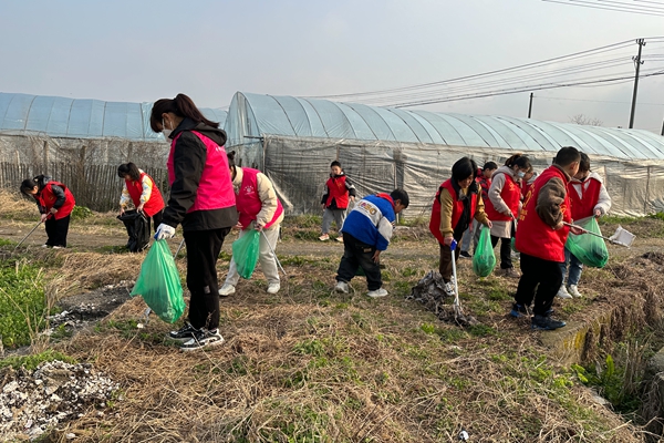 下邵社区党群服务中心：春分十里 正值护绿时.jpg
