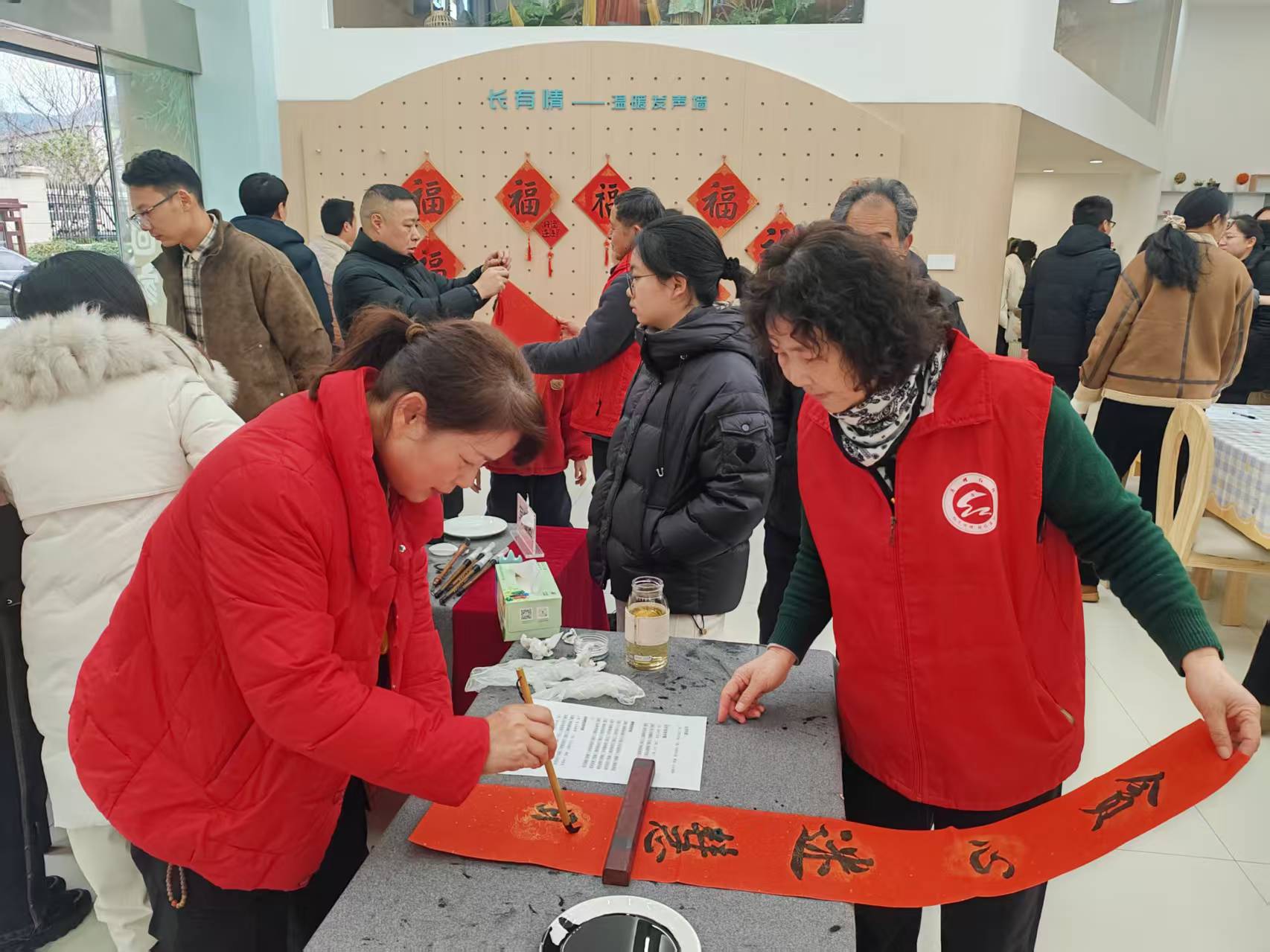 长山社区：墨香迎春护平安 反诈春联送万户.jpg