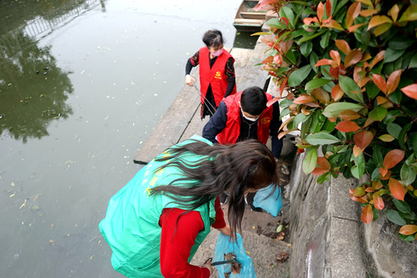 清洁家园  争做美丽北仑人.jpg